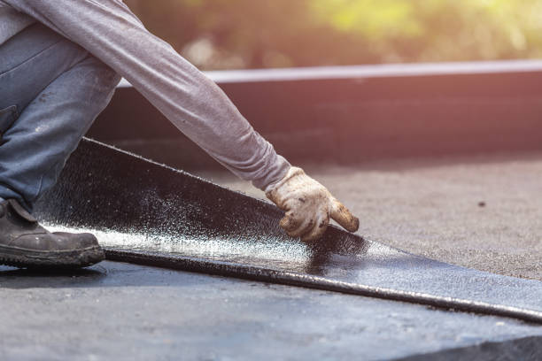 Professional Waterproofing technician working in Blaine, MN